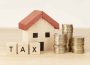 Illustration de la taxe foncière appliquée aux garages et aux biens immobiliers.